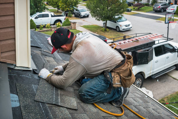 Professional Roofing technician working in Crystal Beach, FL